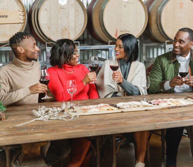 Friends drinking wine at Buckley Vineyards