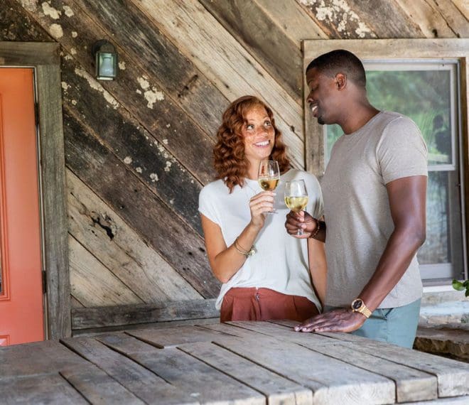 a couple enjoying glasses of wine