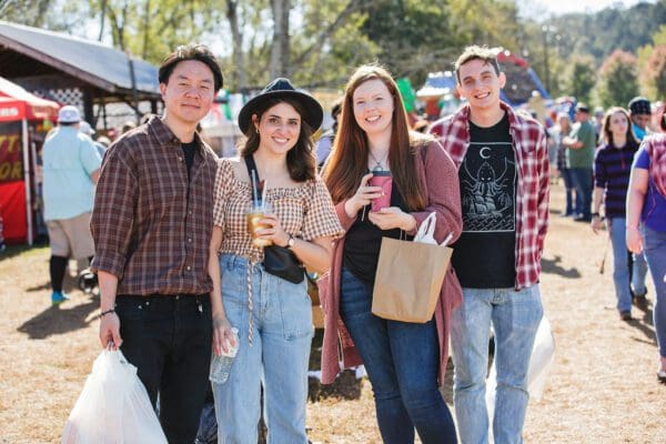 a couple enjoying food at the Apple Festival