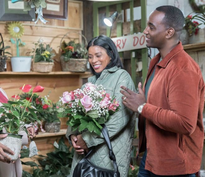 people purchasing floral bouquets