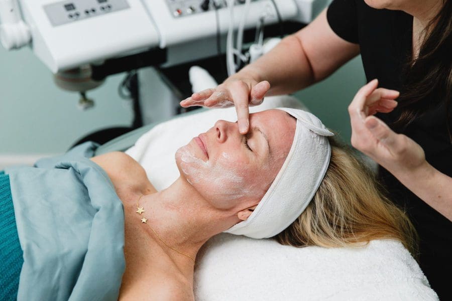 a woman getting a facial