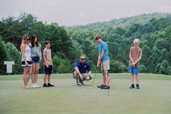 A family golfing