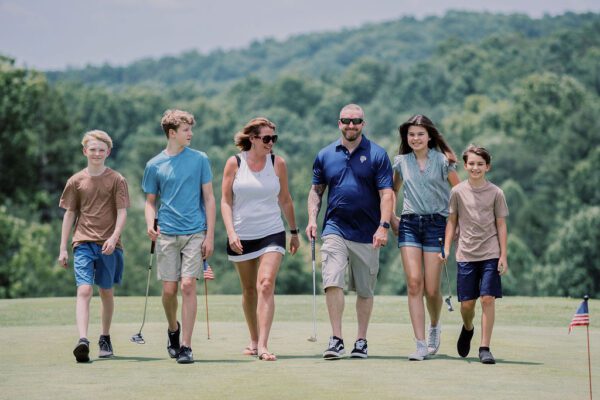 A family golfing