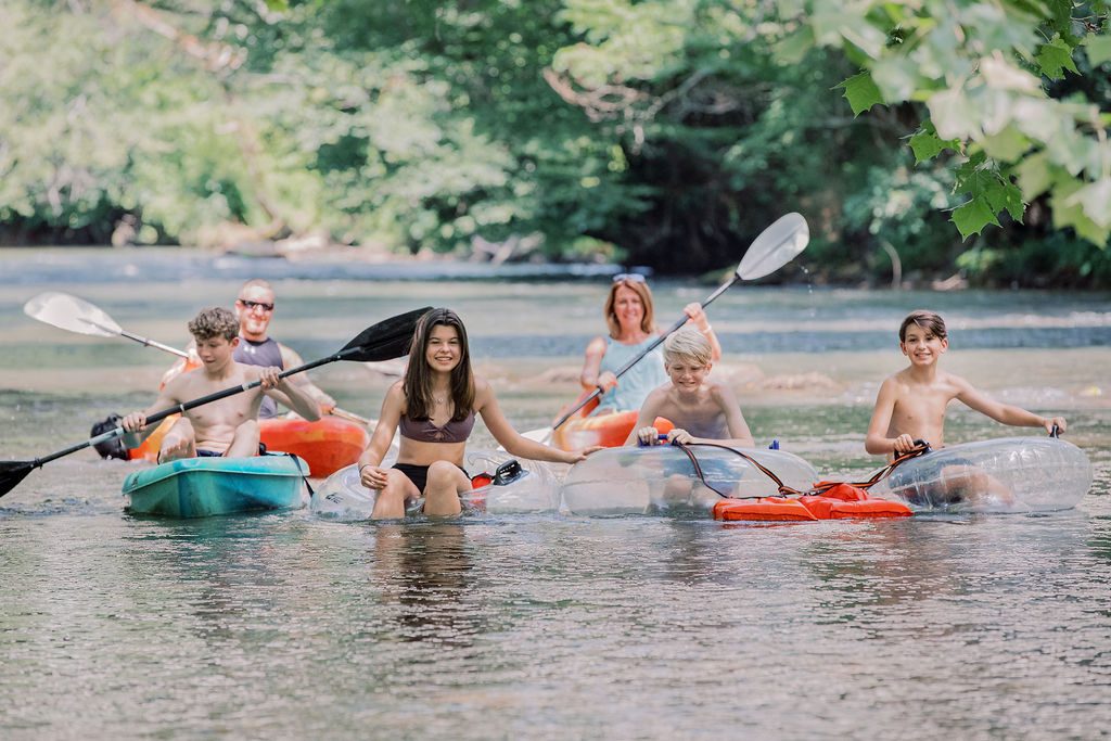 a family rafting and kayaking