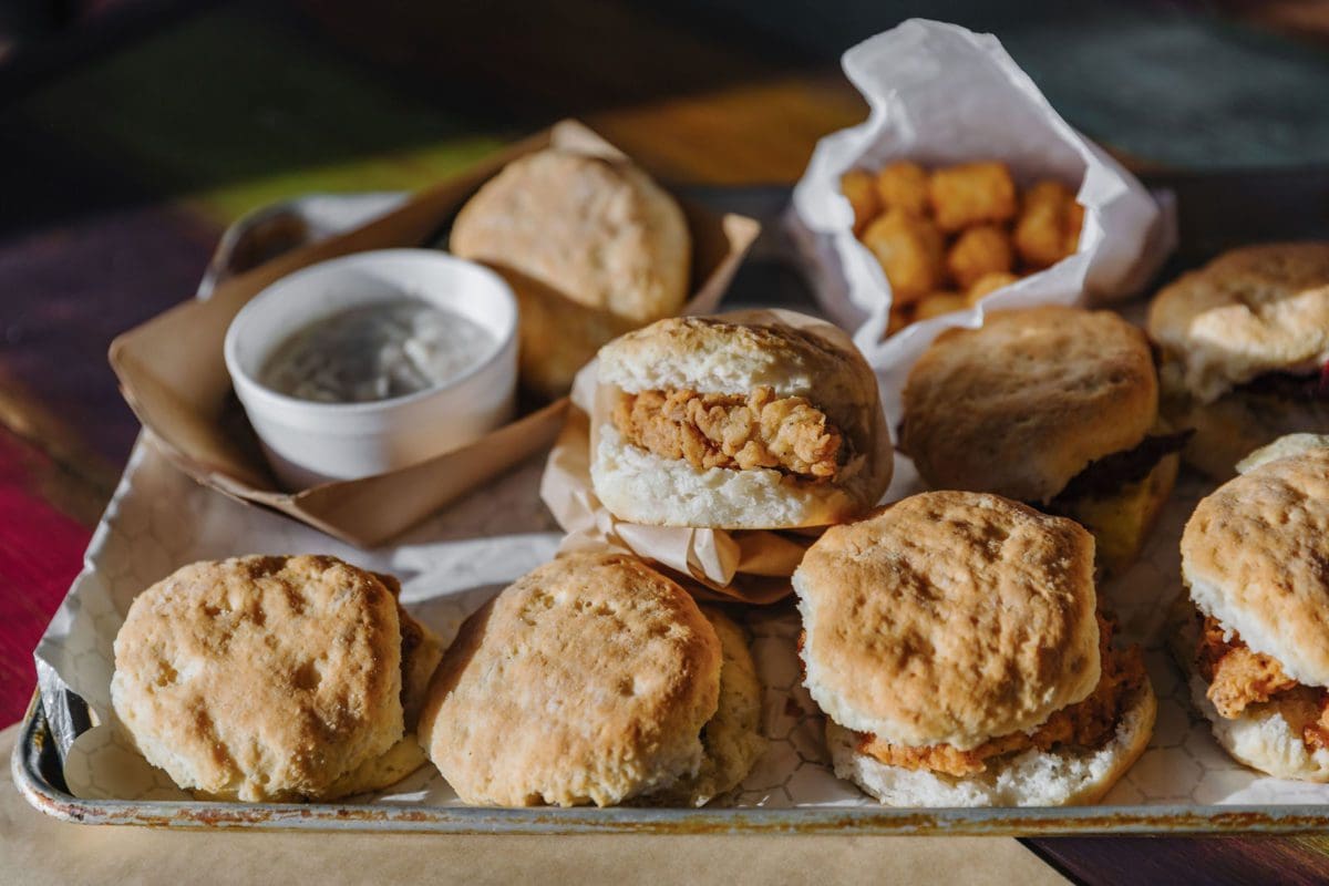 fried chicken on biscuits and tator tots