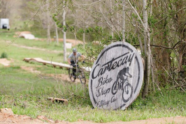 Cartecay Bike Shop sign next to the bike trail