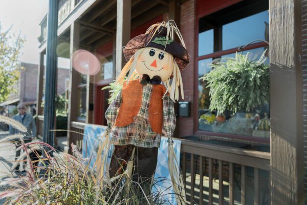 a scarecrow display outside