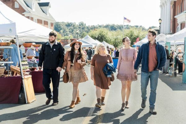 friends outside at a fall festival