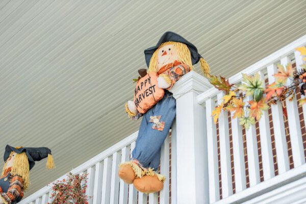a scarecrow on a balcony