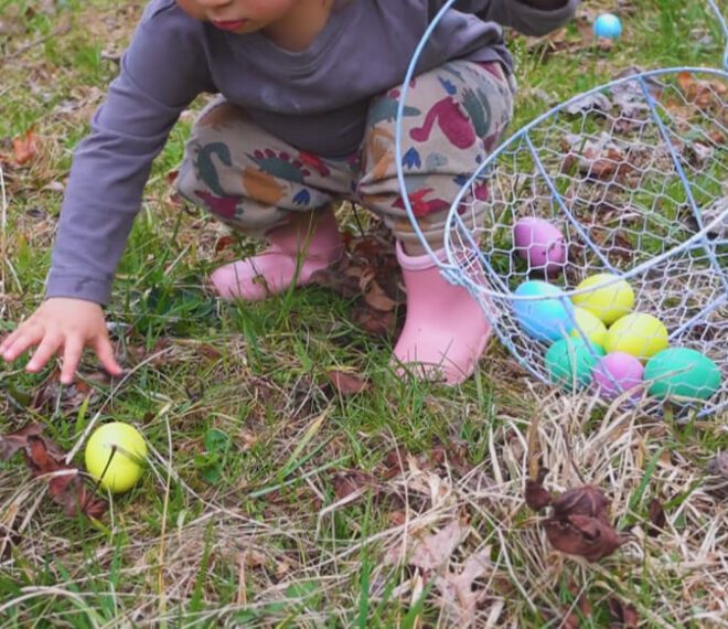 a child gathering easter eggs
