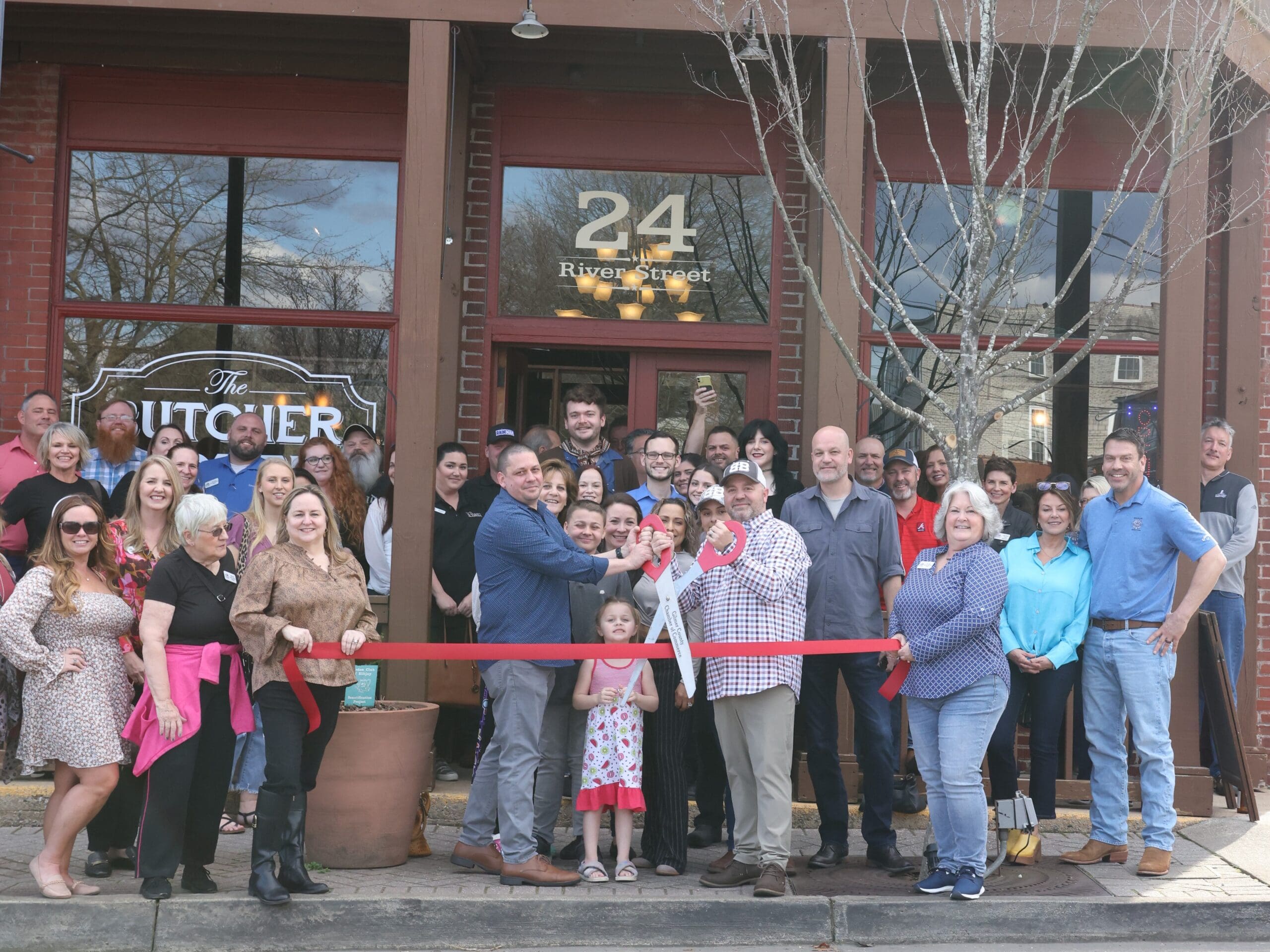 Butcher and Bottle Ribbon Cutting with Owners, Chamber Board of Directors, Ambassadors and community