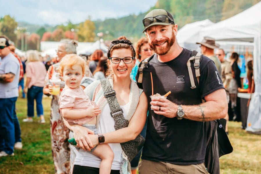 family of 3 enjoying georgia apple festival